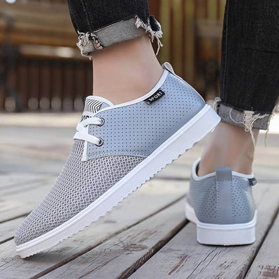 Baskets respirantes pour homme, chaussures sport homme ultra-légères avec semelle orthopédique. Sneakers mode idéales pour la marche, le running et un look casual ou sportif.