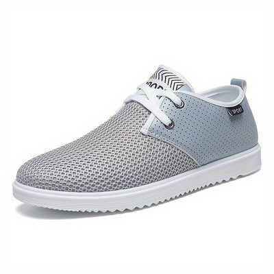 Sneakers homme streetwear, baskets mode en mesh respirant avec semelle antidérapante. Chaussures de sport homme confortables pour un usage quotidien, en soldes en magasin de chaussures.