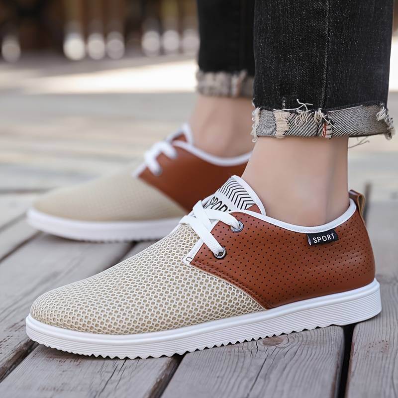 Sneakers homme respirantes, chaussures de sport et basket blanche homme avec semelle amortissante. Chaussure homme blanche idéale pour un style urbain, en soldes.